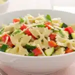 Caesar pasta salad with bowtie pasta and vegetables