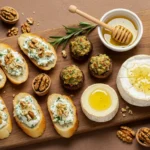 Elegant goat cheese appetizers on a wooden platter with honey and herbs