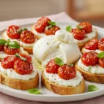 Burrata and stracciatella crostini with cherry tomatoes