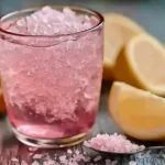 Pink salt trick recipe drink with lemon and ice