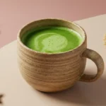 A calming cup of Japanese Mounjaro made with matcha, kelp, and ginger, served in a ceramic mug.